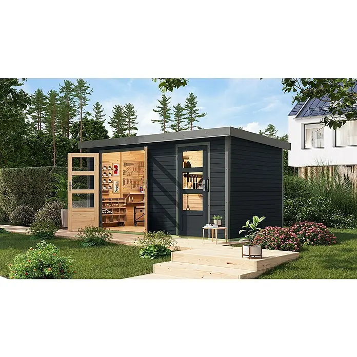 Karibu Gartenhaus Merkur C - Außenmaß inkl. Dachüberstand (B x T): 431,5 x 235 cm, Holz, Anthrazit/Grau - Ein modernes Gartenhaus in Anthrazit mit offenen Holztüren, das als Werkstatt dient, umgeben von einem gepflegten Garten mit Pflanzen.