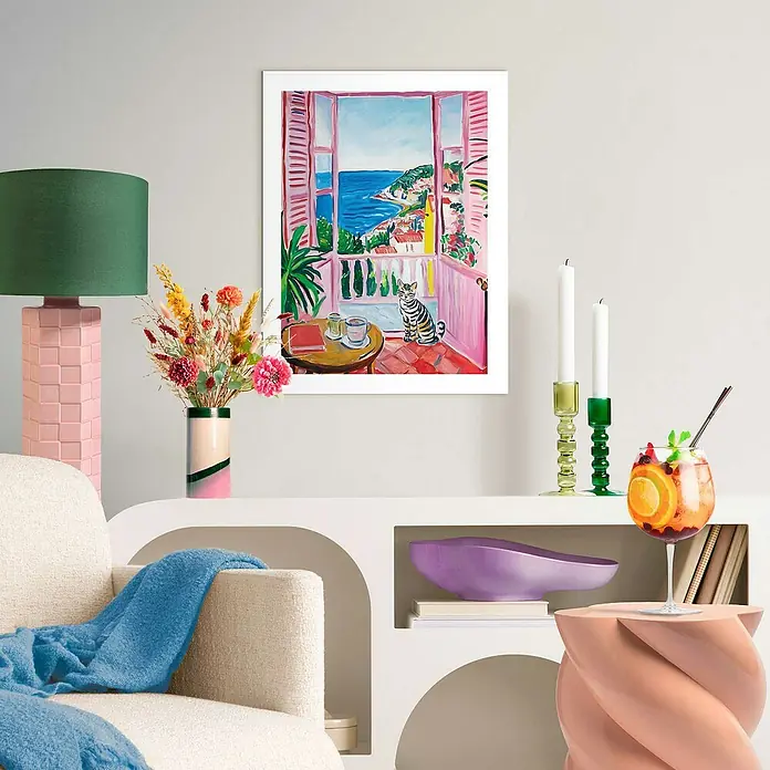 Reinders Bild Slim Frame White - Balcony Holiday, B x H: 30 x 40 cm - Das Wandbild zeigt eine farbenfrohe Balkonszene mit einer Katze, die den Blick auf das Meer genießt. Ein dekoratives Detail für jeden Raum.