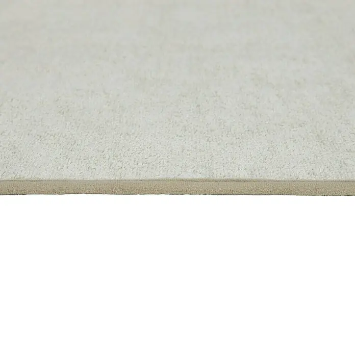 Badteppich Malibu - 60 x 100 cm, Beige, 100% Polyester - Nahaufnahme eines Teppichs mit beiger Unterseite. Das Produkt zeichnet sich durch seine weiche Oberfläche und angenehme Haptik aus.