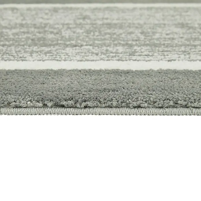 Badteppich Maui - 50 x 80 cm, Grau, 100% Polyester - Detailaufnahme eines grauen Teppichs mit modernem Muster, ideal für stilvolle Wohnräume.