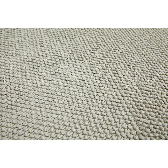 Badteppich Atlanta - 50 x 80 cm, Grau, 100% Baumwolle - Nahaufnahme eines beigen Badteppichs mit einer dichten, genoppten Textur, die Weichheit und Komfort vermittelt. Ideal für Badezimmer.