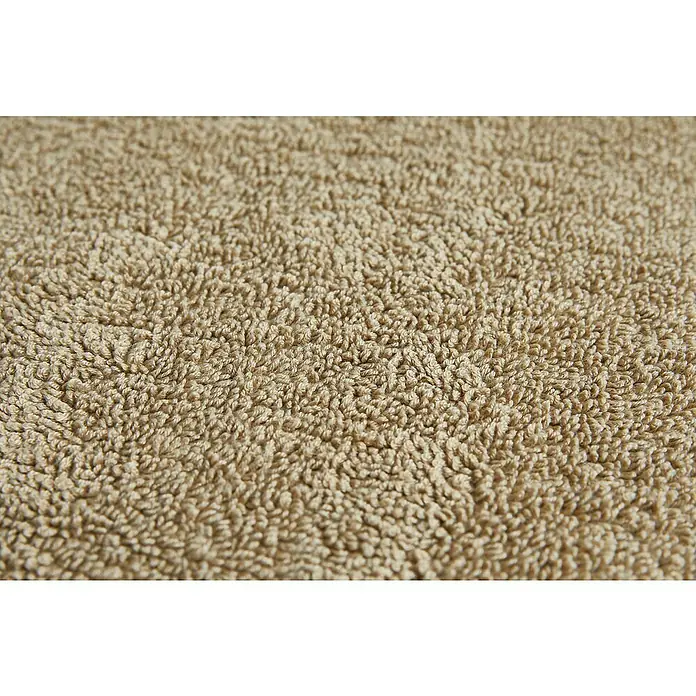 Badteppich Malibu - 60 x 100 cm, Taupe, 100% Polyester - Nahaufnahme eines beigen Frotteehandtuchs. Die weiche Textur ist deutlich sichtbar.