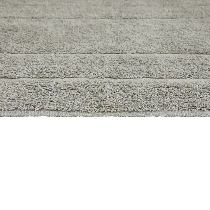 Badteppich Havanna - 50 x 80 cm, Taupe, Border, 80% Baumwolle, 20% Polyester - Nahaufnahme einer gestreiften, hellgrauen Badematte mit weicher Textur, ideal für Badezimmerböden.