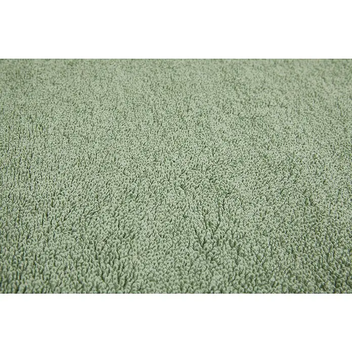 Badteppich Malibu - 60 x 100 cm, Salbei, 100% Polyester - Nahaufnahme eines hellgrünen Frotteehandtuchs, das eine weiche und saugfähige Textur für den täglichen Gebrauch im Badezimmer zeigt.