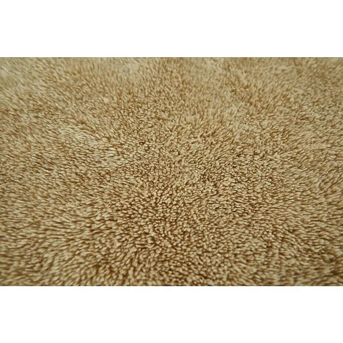 Badteppich Florida - 60 x 60 cm, Taupe, 100% Polyester - Nahaufnahme eines beigen, flauschigen Teppichs, der eine weiche und einladende Textur zeigt. Ideal für gemütliche Wohnräume.