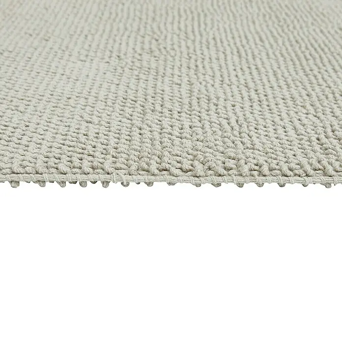 Badteppich Atlanta - 50 x 80 cm, Grau, 100% Baumwolle - Nahaufnahme eines beigen, handgefertigten Teppichs mit strukturierter Oberfläche, ideal für ein gemütliches Zuhause.