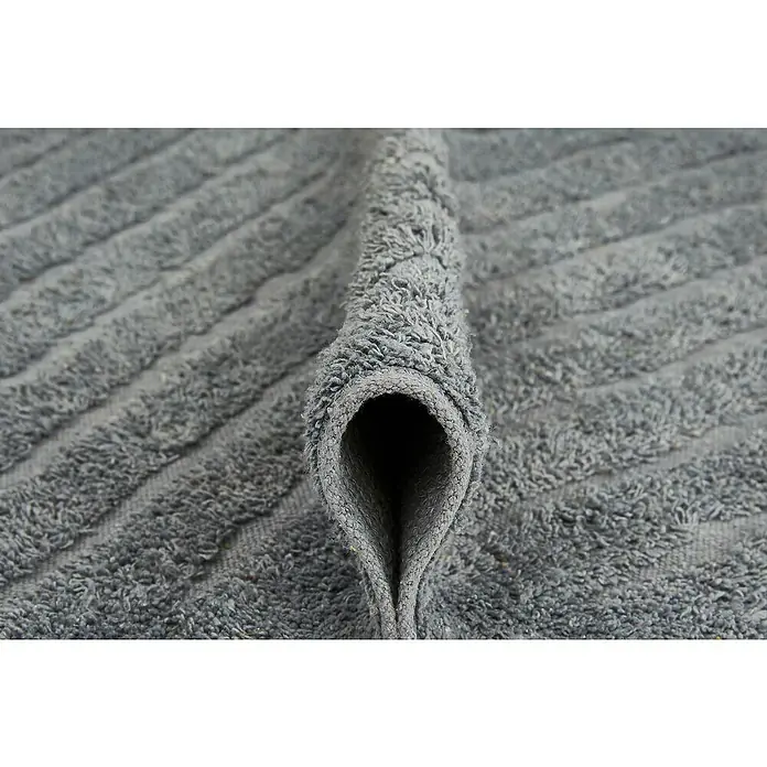 Badteppich Havanna - 50 x 80 cm, Grau, Stripe, 80% Baumwolle, 20% Polyester - Nahaufnahme eines grauen Frotteehandtuchs mit gerippter Textur, das für Weichheit und Saugfähigkeit sorgt.