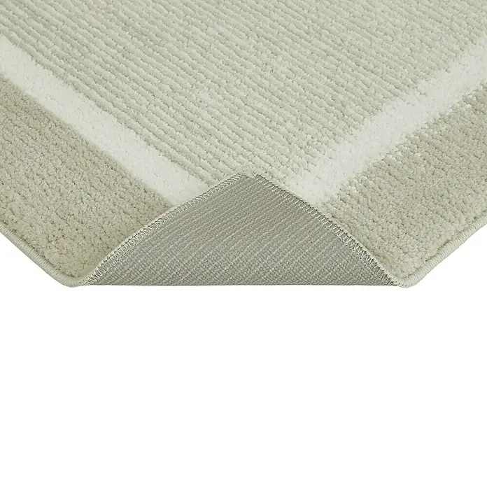 Badteppich Maui - 50 x 80 cm, Beige, 100% Polyester - Nahaufnahme eines Teppichs mit minimalistischem Design und sanften, neutralen Farbtönen, der eine subtile Eleganz ausstrahlt.