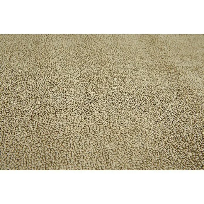 Badteppich Malibu - 60 x 100 cm, Taupe, 100% Polyester - Nahaufnahme eines beigen, flauschigen Handtuchs, das durch seine weiche Textur und Farbgebung besticht. Ideal für Komfort und Stil im Badezimmer.