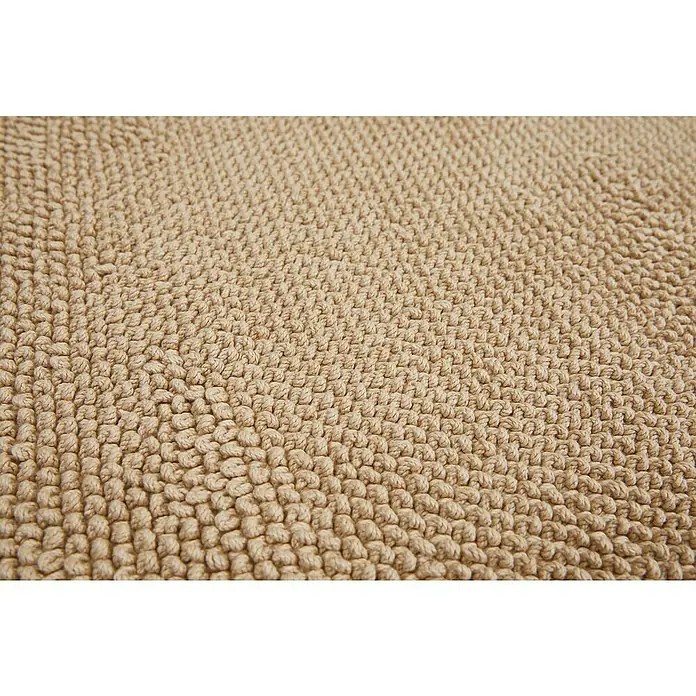Badteppich Atlanta - 50 x 80 cm, Beige, 100% Baumwolle - Nahaufnahme eines beigefarbenen Badteppichs mit Schlaufenstruktur, der eine weiche und saugfähige Oberfläche zeigt.\n