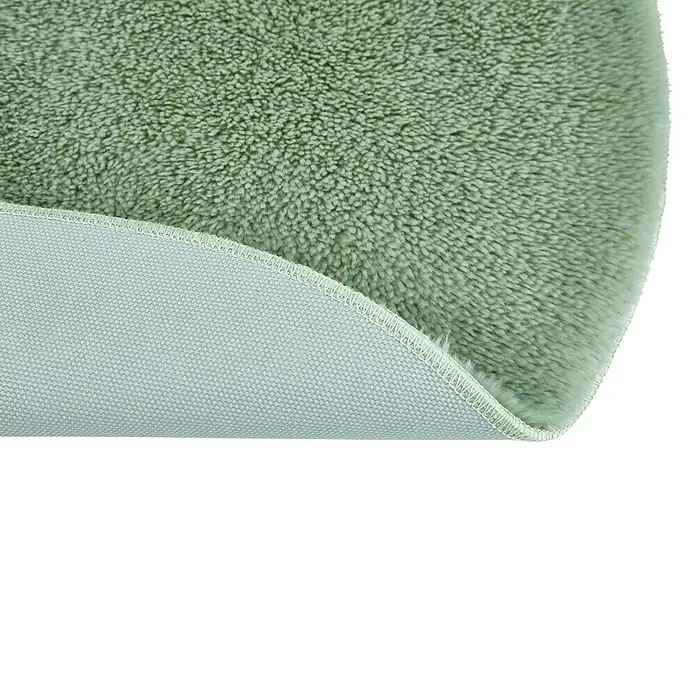 Badteppich Florida - 60 x 60 cm, Salbei, 100% Polyester - Detailaufnahme eines mintgrünen Badezimmerteppichs mit weicher Textur und rutschfester Rückseite für Komfort und Sicherheit.