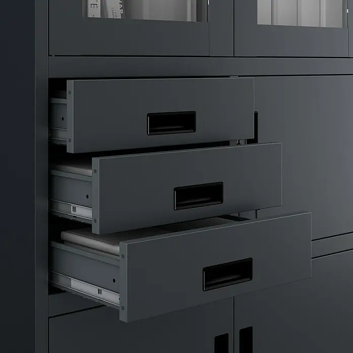 Jan Nowak Aktenschrank Filip - B x T x H: 90 x 40 x 185 cm, Anthrazit - Detailaufnahme eines grauen Aktenschranks mit drei teilweise geöffneten Schubladen und schwarzen Griffen.