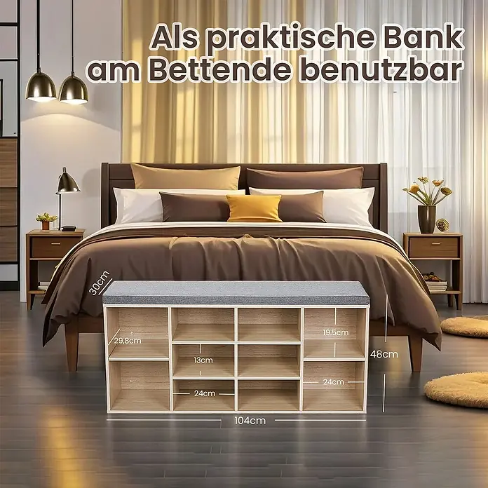 Schuhbank - 30 x 104 x 48 cm, Eiche/Grau - Eine gepolsterte Schuhbank mit mehreren Fächern dient als praktische Sitzgelegenheit am Bettenende und bietet Stauraum für Schuhe.