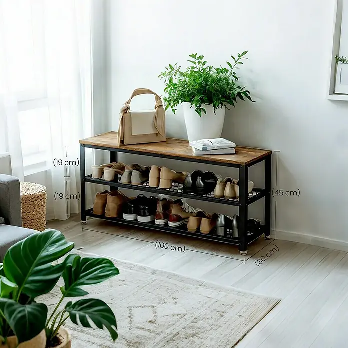 Schuhregal - L x B x H: 30 x 100 x 45 cm, Braun/Schwarz - Ein Schuhregal aus Holz und Metall mit mehreren Ablagen, gefüllt mit Schuhen, neben einer Zimmerpflanze.