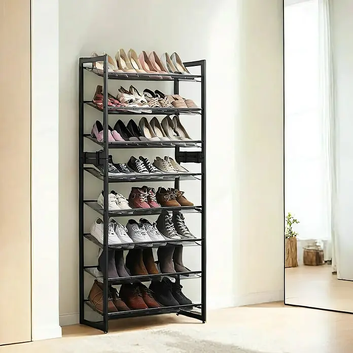 Schuhregal - L x B x H: 30,7 x 74 x 104 cm, Schwarz - Ein moderner Schuhständer mit mehreren Ebenen, gefüllt mit einer Vielzahl von Schuhen, der praktischen Stauraum bietet.