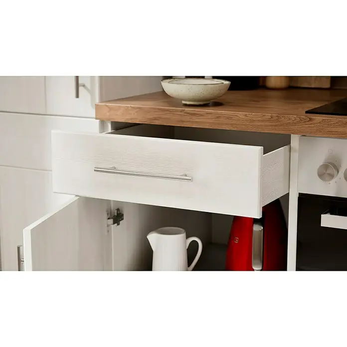 Respekta Premium Küchenzeile Anton - Breite: 300 cm, Weiß, Mit Elektrogeräten - Offene weiße Schublade und Schrank mit rotem Toaster und weißem Krug in einer modernen Küche mit Holzarbeitsplatte und weißen Möbeln.