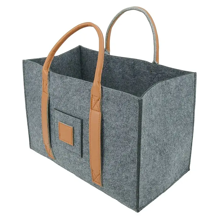 Valo Filzkorb Niva - 50 x 34 x 27 cm, Grau - Eine graue Filztasche mit braunen Ledergriffen, ideal zum Einkaufen oder als stilvolle Aufbewahrung.