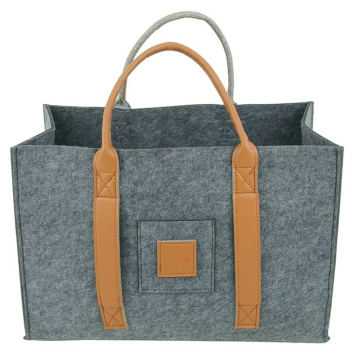 Valo Filzkorb Niva - 50 x 34 x 27 cm, Grau - Graue Filztasche mit braunen Ledergriffen und einer kleinen aufgesetzten Tasche. Ideal für Einkäufe oder als stilvolle Aufbewahrung.