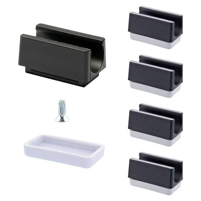 Wagner System Möbelgleiter-Set - L x B: 31 x 18 mm, Lochdurchmesser: 12 mm, Rechteck, 4 Stk. - Produktbild von schwarzen Gleitern und einer weißen Basis mit einer Schraube, ideal für Möbelmontage und Reparaturen.
