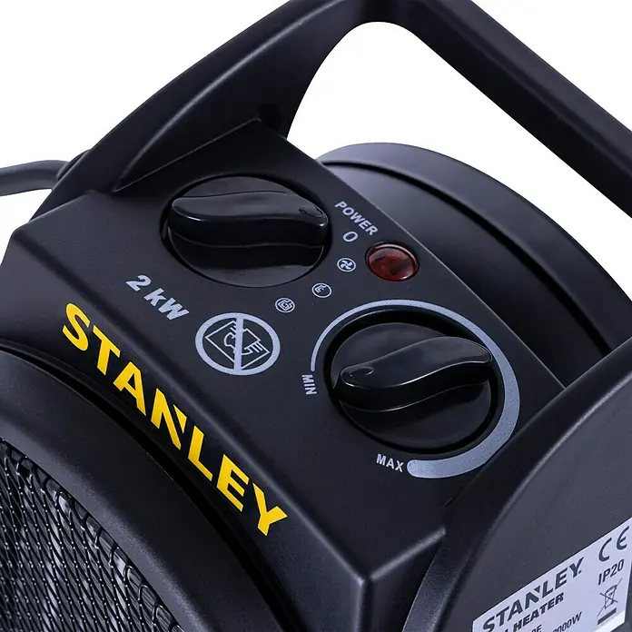 Stanley Keramik-Heizlüfter SXJH002000E - Schwarz. Gelb - Detailansicht eines Stanley Heizlüfters mit Bedienelementen für Leistung und Temperatur.