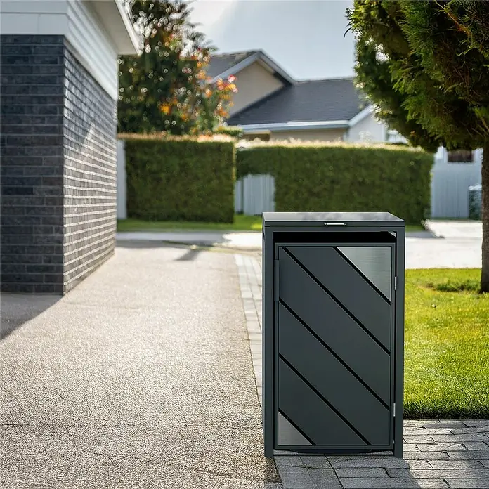 Metzler Mülltonnenbox - 68 x 80 cm, Stahl, Anthrazit, Geeignet für Anzahl Mülltonnen: 1 Stk. - Bild eines modernen, grauen Mülltonnenbox für den Außenbereich mit schrägen Linien. Ideal zur stilvollen Müllaufbewahrung im Garten oder vor dem Haus.