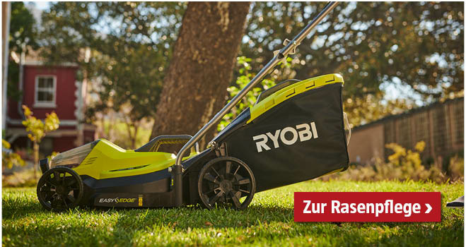 Ryobi Rasenmäher steht im Garten im Gras