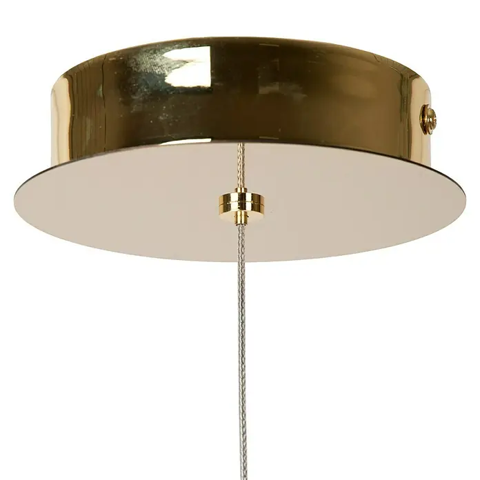 Lucide Cintra LED-Pendelleuchte rund - 5,7 W, L x B x H: 150 x 14 x 14 cm, Kristall, Anzahl Leuchtmittel: 1 Stk. - Nahaufnahme einer modernen goldenen Pendelleuchte mit einem cremefarbenen Schirm und einem silbernen Kabel, die Eleganz und Stil ausstrahlt.