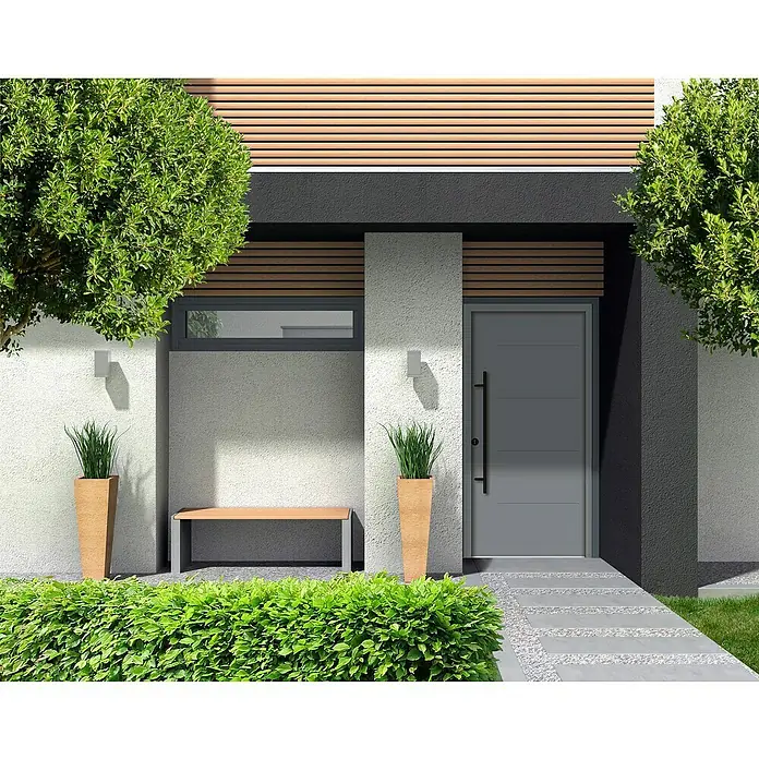 Splendoor Haustür Thermodoor PLUS SPL Black Design - 110 x 210 cm, DIN Anschlag: Links, Verkehrsgrau - Graue Haustür mit senkrechtem Griff an einem modernen Haus mit Pflanzen und Steinweg. Die Tür ist schlicht und elegant gestaltet.