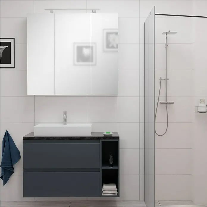Camargue Espacio Badmöbel-Set i125 - 100 cm, Gama anthrazit glänzend - Ein elegantes Badezimmer mit einem stilvollen grauen Waschtisch mit Schubladen und einem passenden Spiegelschrank.