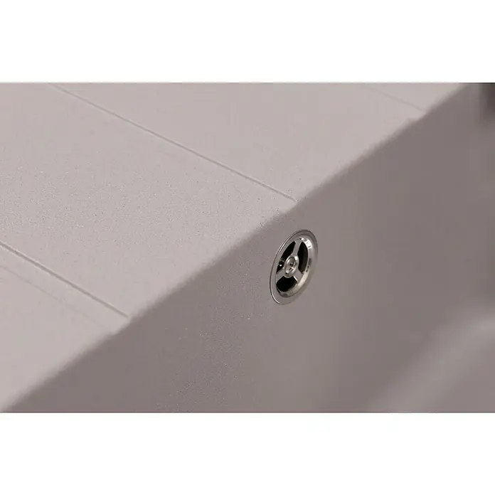 Respekta Einbauspüle Austin - 100 x 50 cm, Grau, Anzahl Becken: 1 Stk. - Nahaufnahme eines Spülbeckens mit Fokus auf den Ablauf, der durch sein glänzendes Metall und präzises Design hervorsticht.