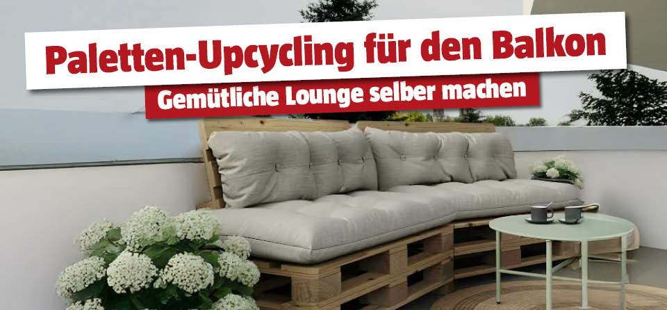 Selbstgemachte Paletten Lounge steht am Balkon, daneben Hortensien im Topf
