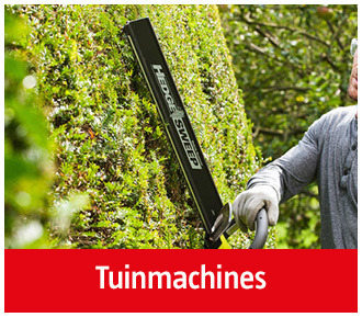 persoon-gebruikt-elektrische-heggenschaar-in-tuin-bauhaus
