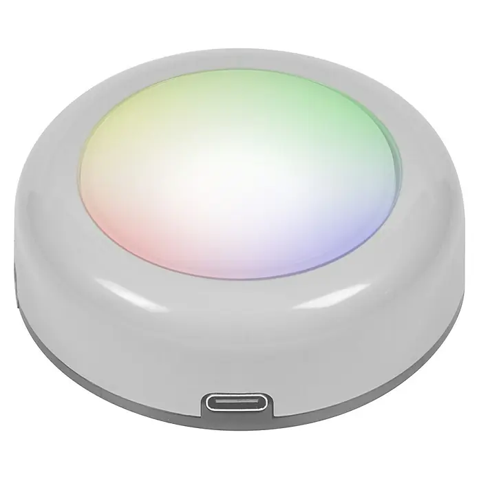Osram Luz de armario LED Dot-It Twist & Shake - 1 luz, 0,5 W, Blanco - Primer plano de una lámpara redonda blanca con un puerto USB-C y una luz suave que cambia de color.