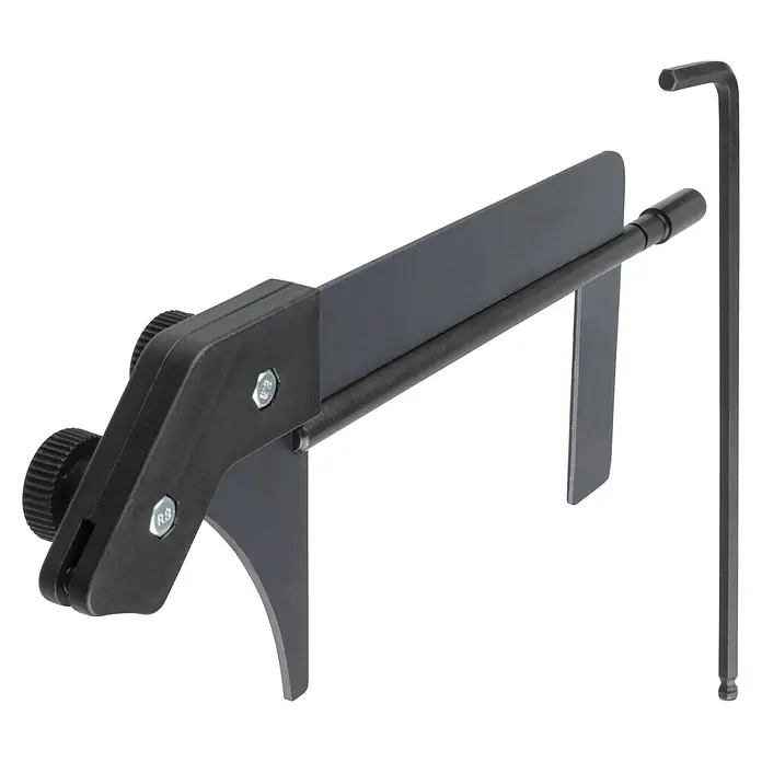 Wolfcraft Cuña de separación divisor 6916000 - Metal - Un primer plano de una recortadora de bordes negra con una llave Allen, ideal para trabajos de carpintería precisos y procesamiento de bordes.