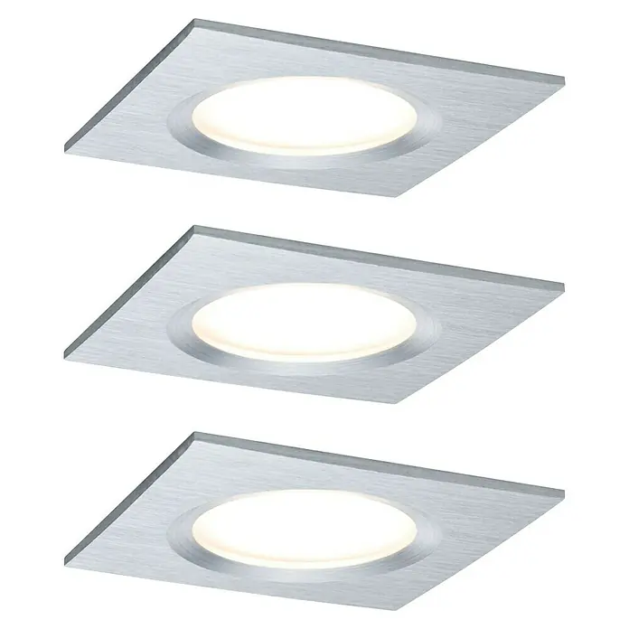 Paulmann Nova LED-Einbauleuchten-Set Plus Coin - 6 W, L x B x H: 7,8 x 7,8 x 4,5 cm, Alu gedreht, 3 Stk., Warmweiß - Drei quadratische LED-Einbaustrahler mit gebürstetem Metallrahmen und warmweißem Licht auf schwarzem Hintergrund.