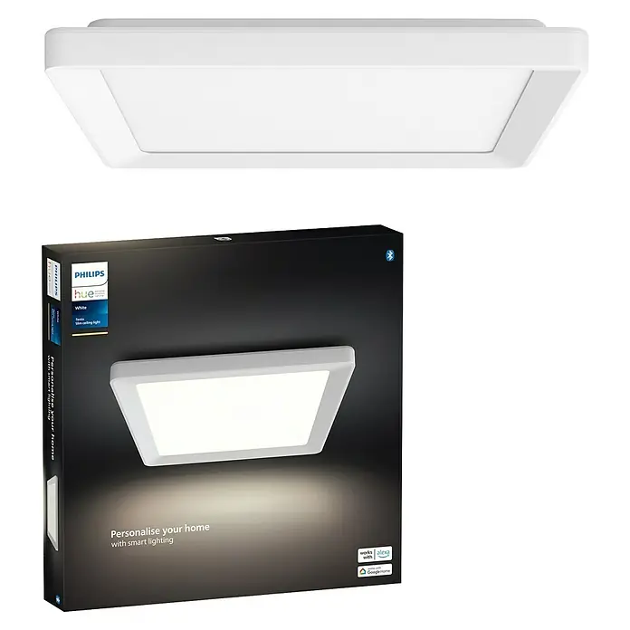 Philips Hue LED-Panel White Ambiance Tento S - 12,6 W, L x B x H: 29,5 x 29,5 x 3,5 cm, Weiß, Warmweiß - Abgebildet ist eine Philips Hue White Tendo Slim Deckenleuchte und ihre Verpackung. Die smarte Leuchte ist quadratisch und in Weiß gehalten.