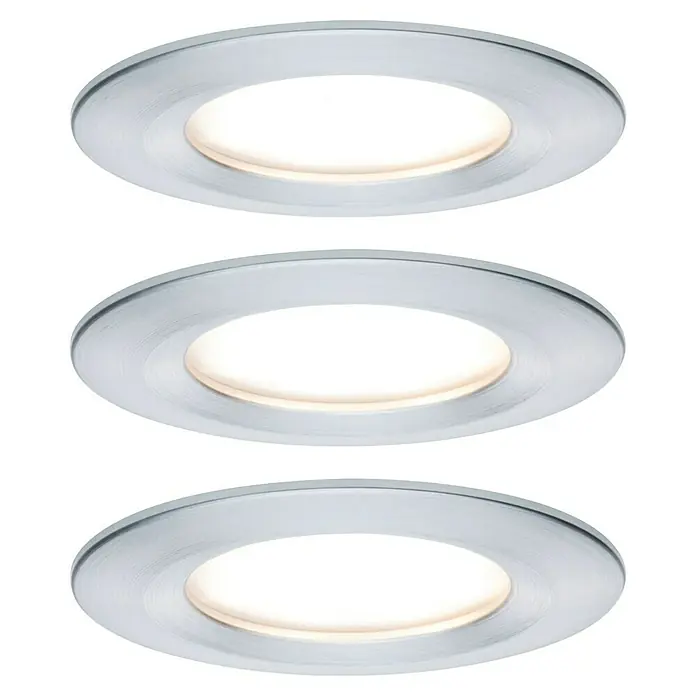 Paulmann Nova LED-Einbauleuchten-Set rund Coin - 3 W, Aluminium, 3 Stk., Warmweiß - Nahaufnahme von drei runden Einbaustrahlern mit silberner Fassung und warmweißem Licht auf schwarzem Hintergrund.