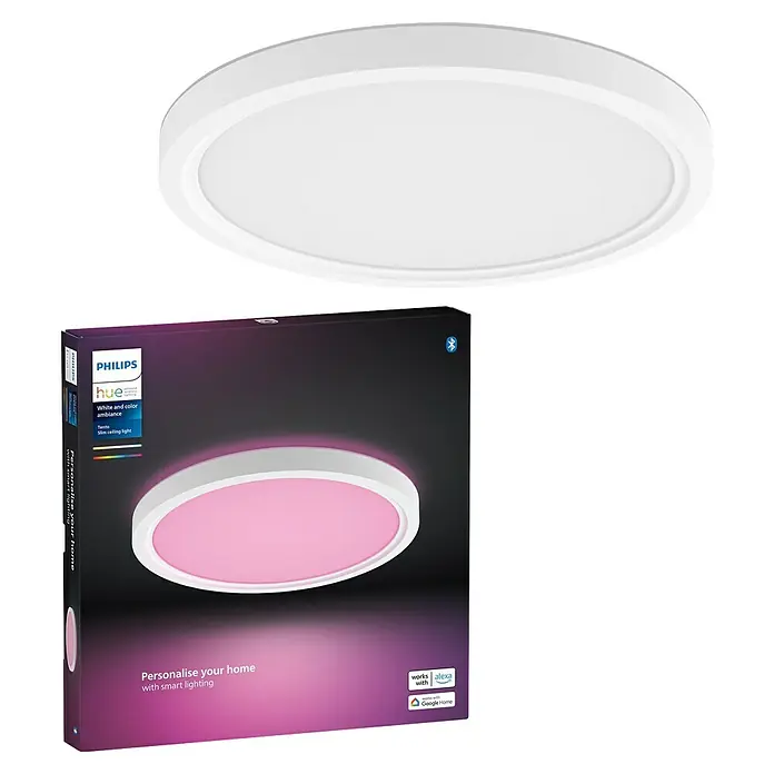 Philips Hue LED-Panel rund White & Color Ambiance Tento S - 25 W, Ø x H: 29,1 x 3,2 cm, Weiß, RGBW - Das Bild zeigt eine Philips Hue Tenta Slim Deckenleuchte in Weiß und deren Verpackung, die die smarte Beleuchtung hervorhebt.