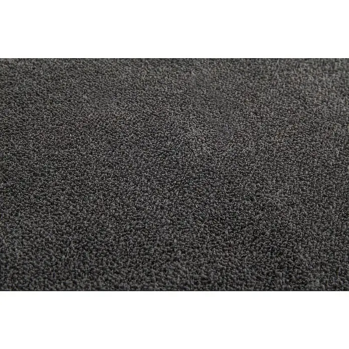 Hochflorteppich Lauria - Anthrazit, 230 x 160 cm, 100 % Polyester - Nahaufnahme eines dunkelgrauen Teppichs mit dichter Textur. Ideal für gemütliche Innenräume und als stilvolle Bodengestaltung.