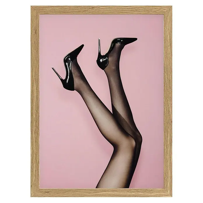 Papermoon Bild - Kick up your Heels, B x H: 60 x 80 cm, Ohne Passepartout, Rahmen Eiche - Gerahmtes Bild von Beinen in schwarzen Strumpfhosen und hochhackigen Schuhen vor einem rosafarbenen Hintergrund, das einen eleganten und stilvollen Eindruck vermittelt.