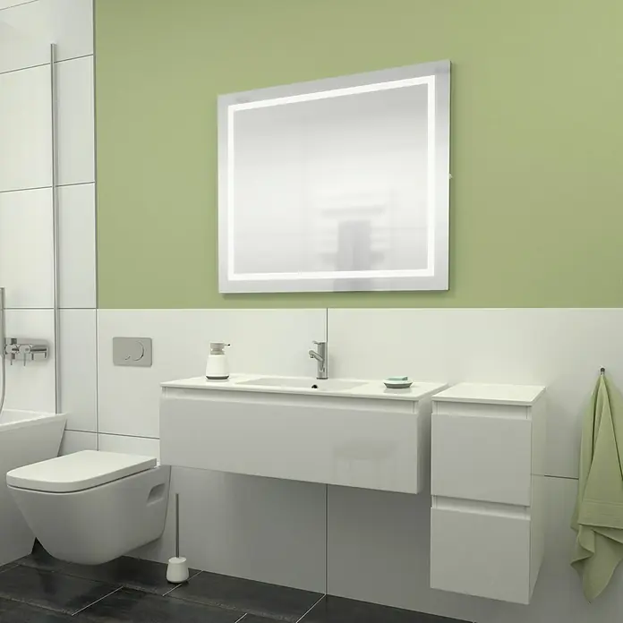 Camargue Espacio Badmöbel-Set L3 - 130 cm, Gama weiß glänzend - Modernes Badezimmer-Interieur mit weißem Waschtisch, Toilette und beleuchtetem Spiegel vor einer hellgrünen Wand.