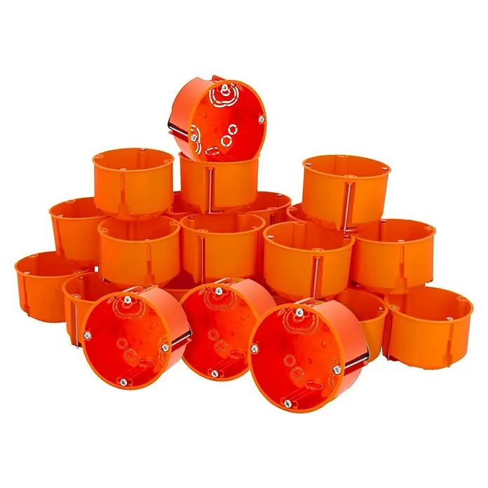 Hohlwanddose Normal - 68 x 47 mm, 1-fach, Orange, 25 Stk. - Eine Nahaufnahme von mehreren orangefarbenen Gerätedosen aus Kunststoff, die in einer Gruppe auf einem schwarzen Hintergrund gestapelt sind.