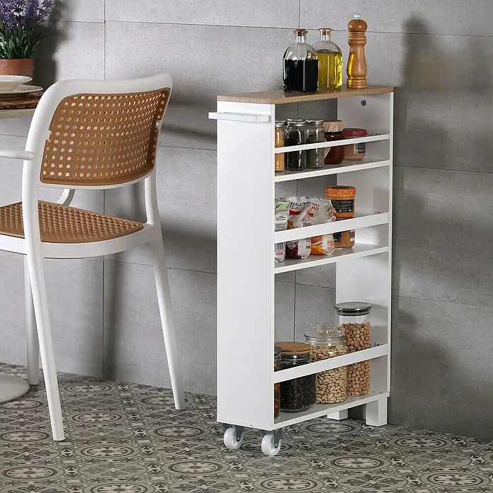 Versa Carro de cocina - L x An x Al: 50 x 15 x 79 cm, Blanco - Toma de un estante de cocina con múltiples estantes llenos de frascos y utensilios de cocina junto a una silla.