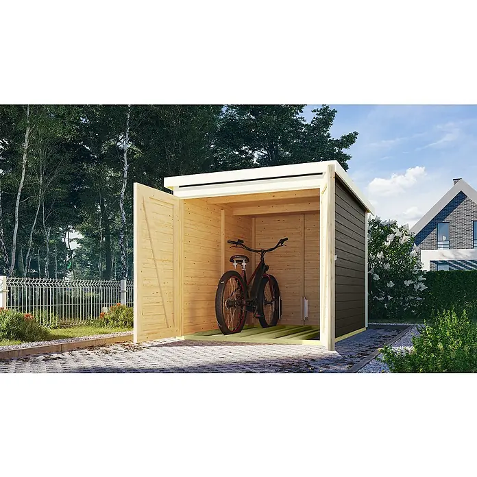 Karibu Fahrradgarage - Holz, Terragrau, Außenmaß inkl. Dachüberstand (B x T): 179 x 227 cm - Eine moderne, hölzerne Fahrradgarage mit geöffneter Tür, die ein Fahrrad zeigt. Im Hintergrund Bäume und ein Haus.