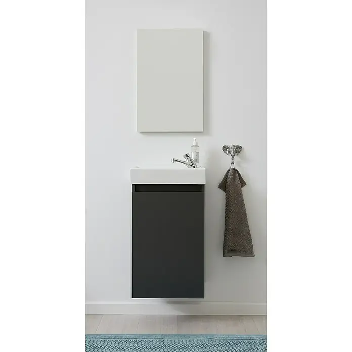 Trendteam Badmöbel-Set Champ - Grau, Matt, B x T x H: 40 x 22 x 110 cm - Eine moderne Waschtischkombination mit einem grauen Unterschrank, einem weißen Aufsatzwaschbecken und einem schlichten Spiegel an einer weißen Wand.