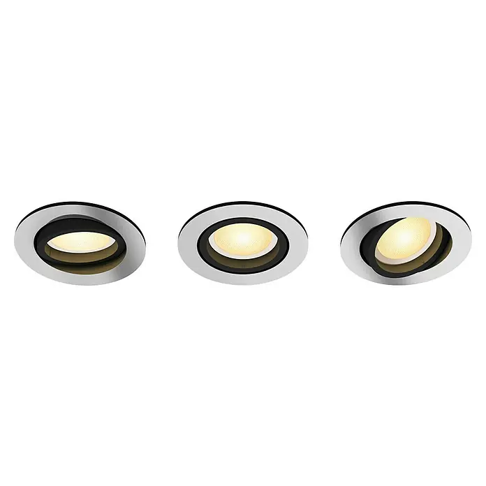 Philips Hue LED-Einbauleuchten-Set rund White Ambience Recessed Milliskin - 4,2 W, Ø x H: 9 x 10 cm, Alu, 3 Stk., Kaltweiß - Nahaufnahme von drei runden Einbaustrahlern mit schwenkbaren Köpfen, die eine moderne Beleuchtungslösung präsentieren.