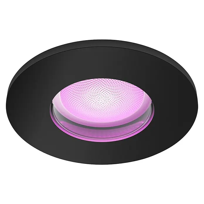 Philips Hue LED-Einbauspot White & Color Ambiance Xamento - RGBW, Durchmesser: 9,4 cm, Schwarz - Nahaufnahme einer runden, schwarzen Deckenleuchte mit einem leuchtend violetten, gemusterten Lichtelement in der Mitte.