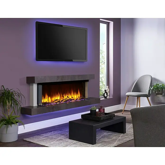 Charlton & Jenrick Chimenea eléctrica i1100E Slim - Negro, 1.500 W, 18,7 x 113,4 x 47,8 cm - Elegante sala de estar con una moderna chimenea eléctrica con retroiluminación azul y un televisor montado encima.