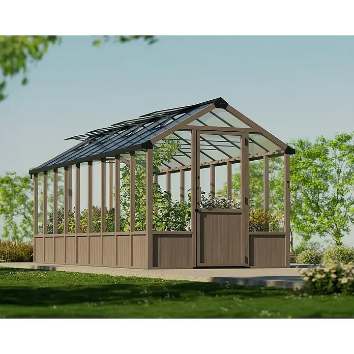 Palram – Canopia Invernadero Natura - Medidas ext. (An x Pr): 249 x 637 cm, Plástico, 4 mm, Natural - La imagen muestra un invernadero con plantas en su interior. Es un bonito invernadero en el jardín.