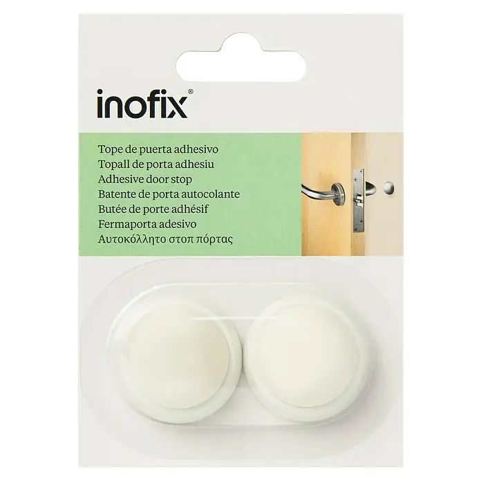Inofix Tope de puerta 2450 - Plástico, Blanco - La imagen muestra topes de puerta adhesivos Inofix, presentando dos protectores redondos autoadhesivos empaquetados en un blíster transparente.